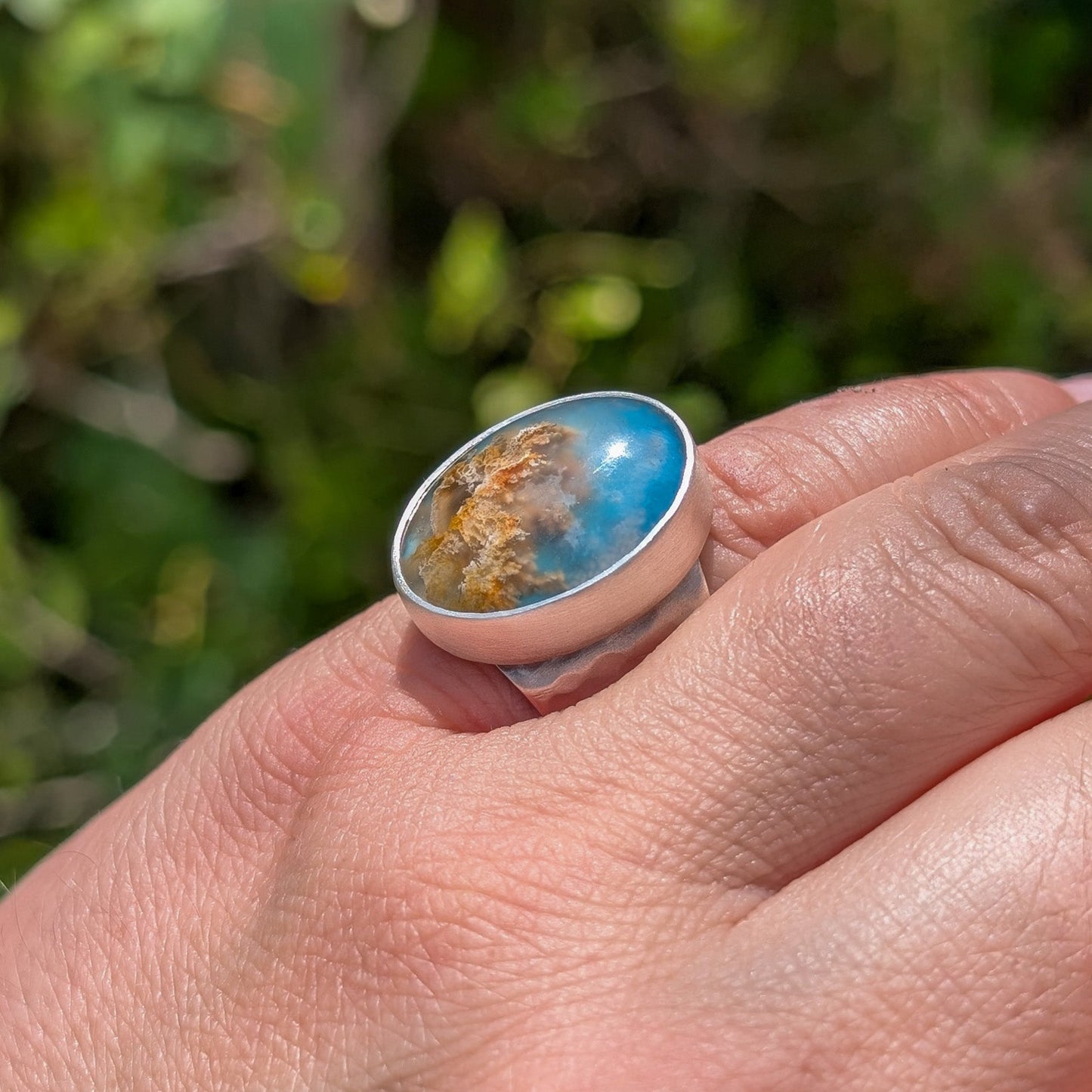 Anillo de plata con ágata pluma