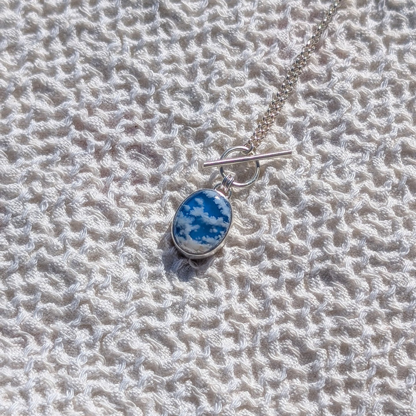 Colgante CIELO en plata con Ágata pluma