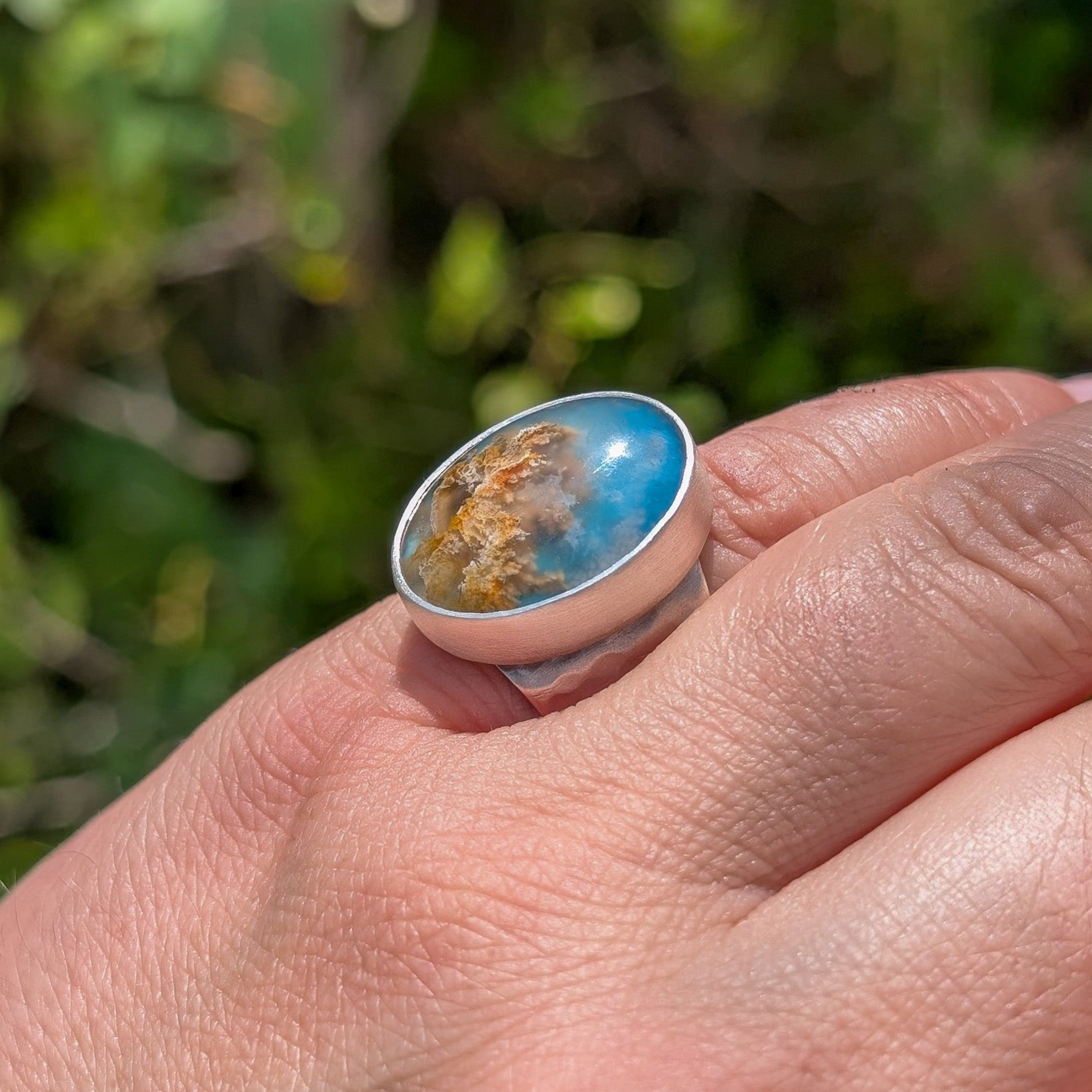 Anillo de plata con ágata pluma