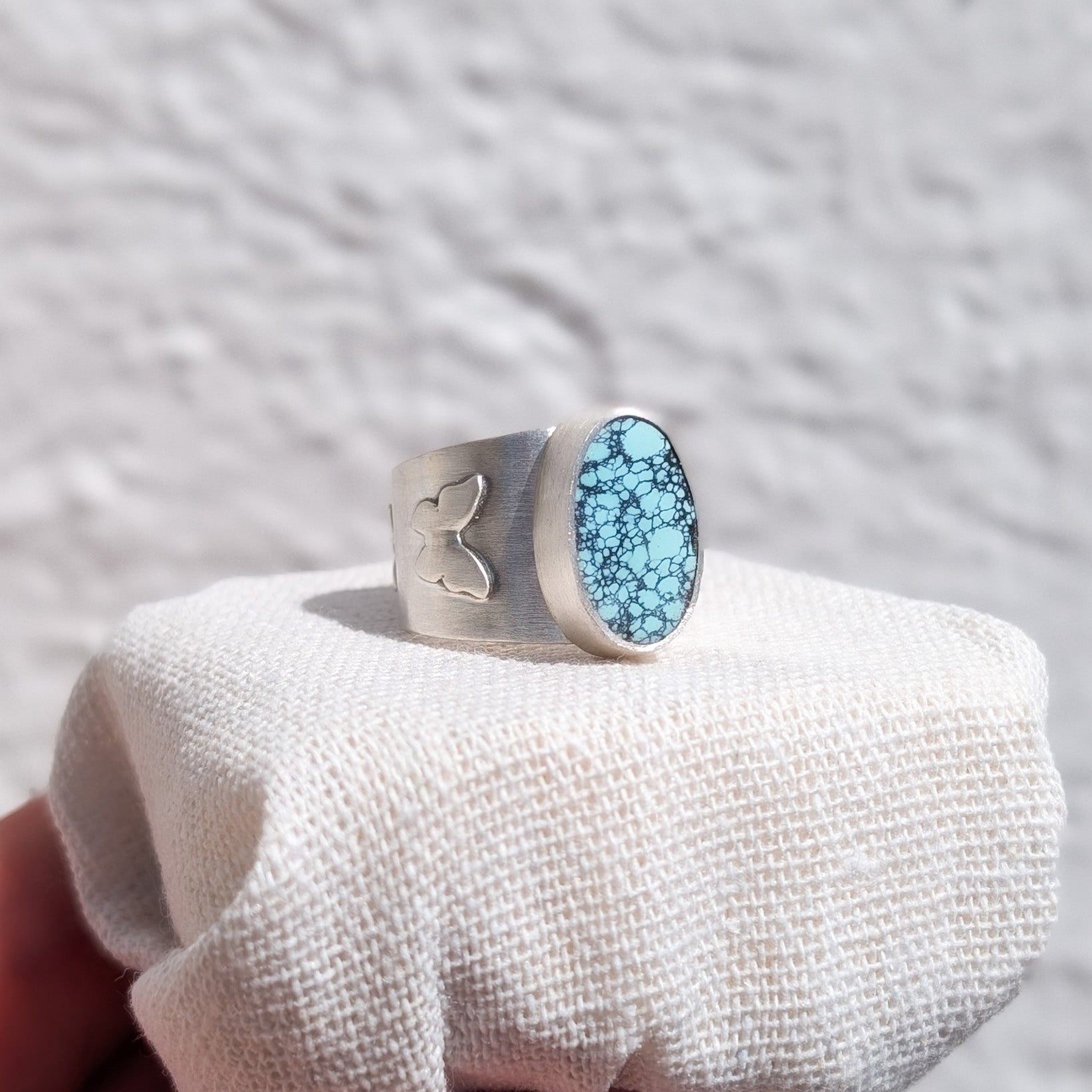 Anillo de plata con mariposas y Turquesa