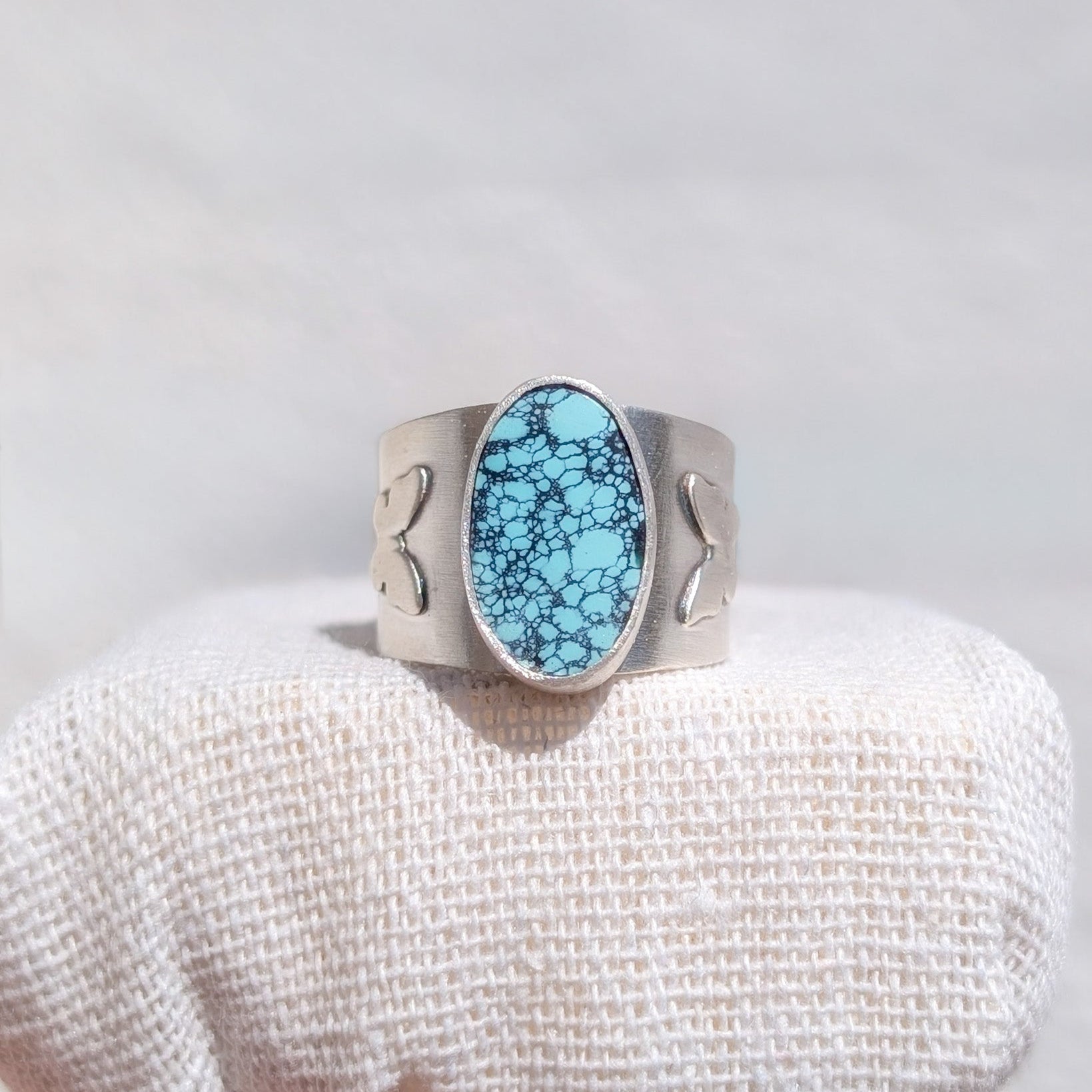 Anillo de plata con mariposas y Turquesa