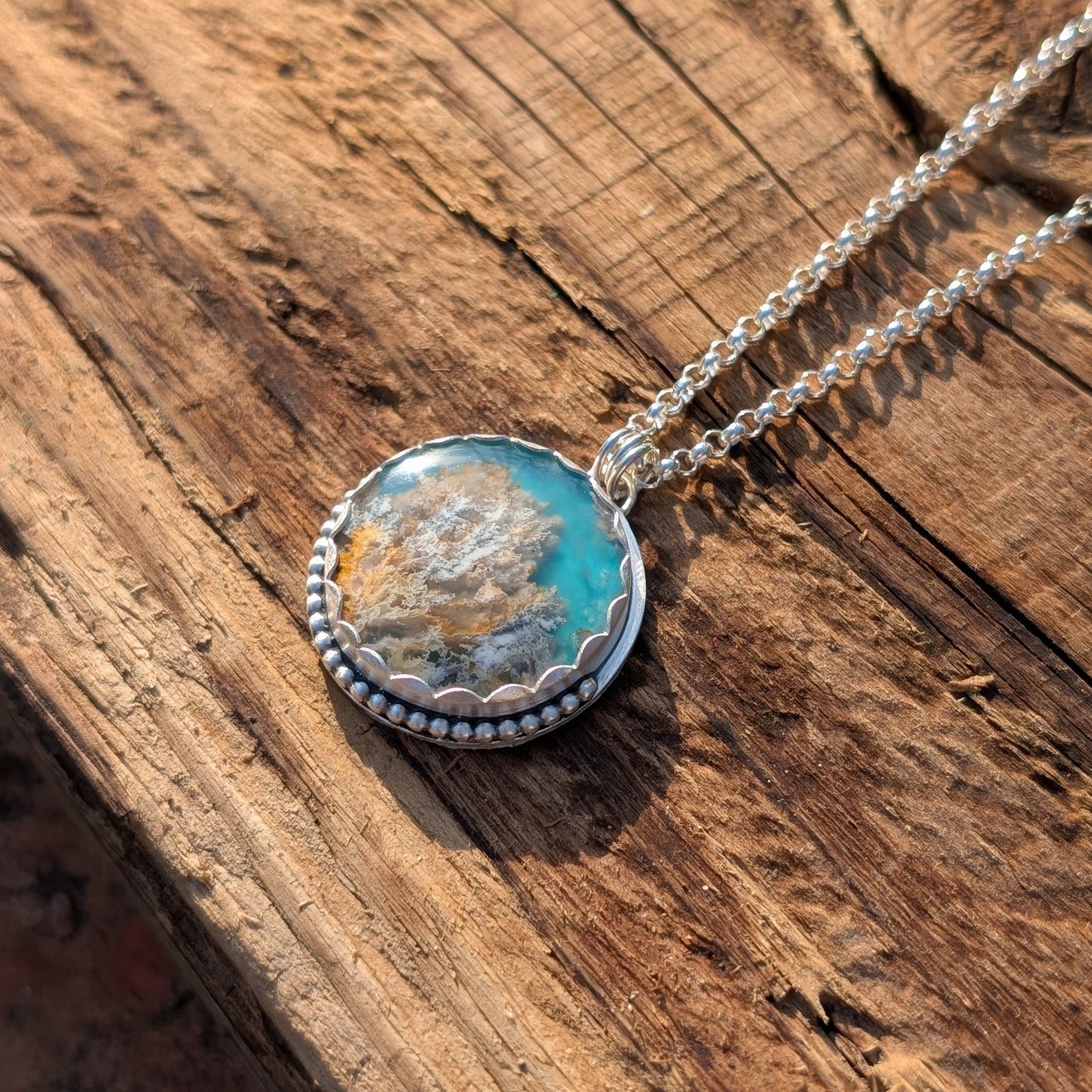 Colgante de plata con ágata pluma