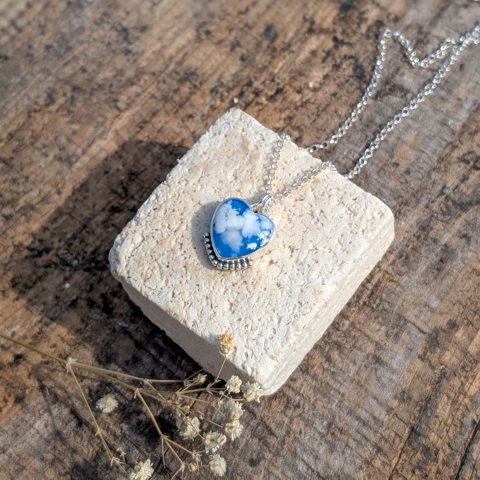 Colgante Cielo de plata corazón con ágata pluma
