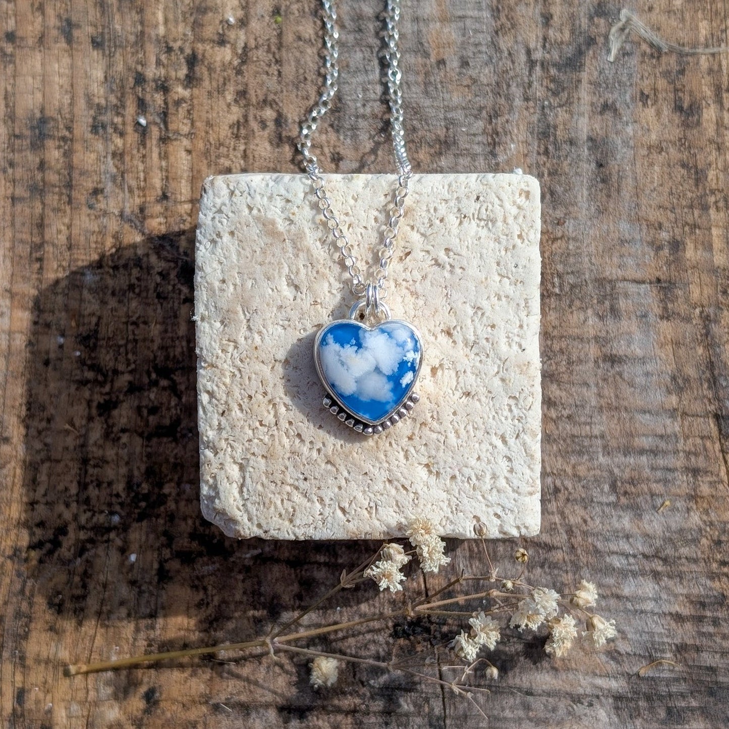 Colgante Cielo de plata corazón con ágata pluma