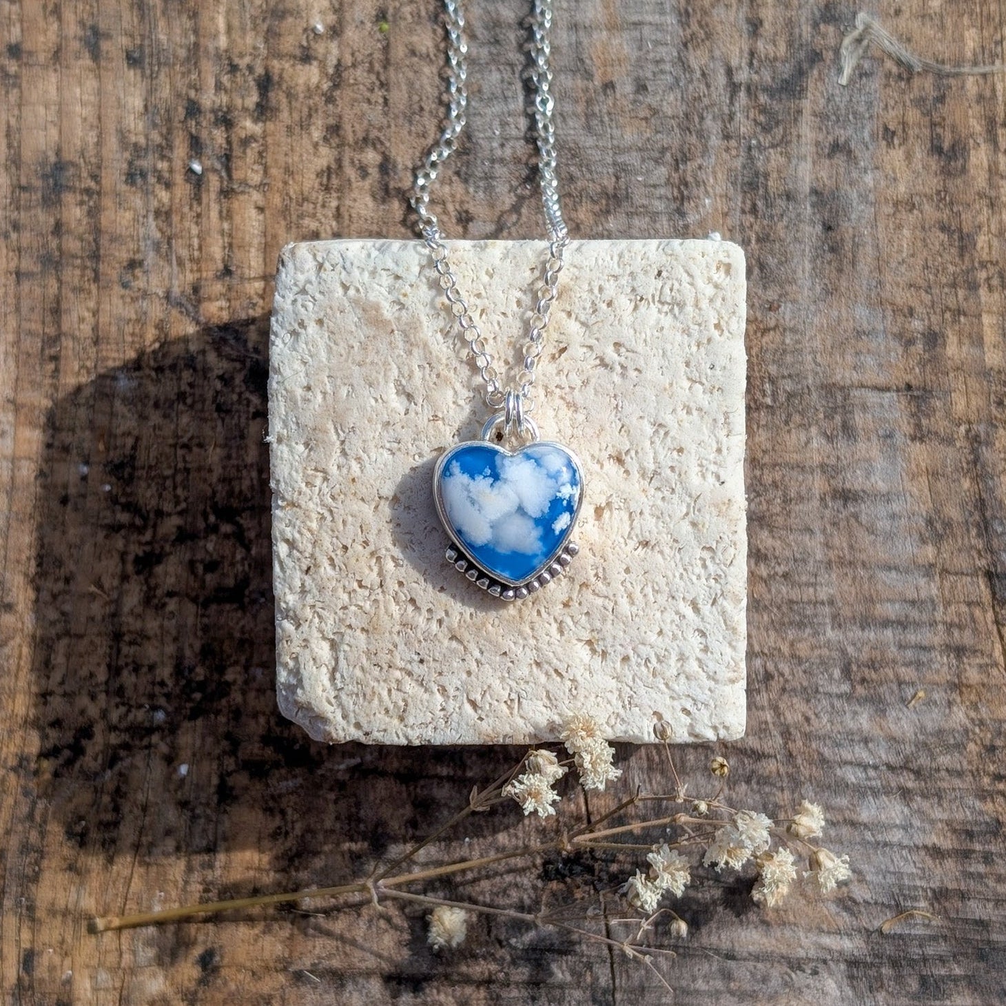 Colgante Cielo de plata corazón con ágata pluma