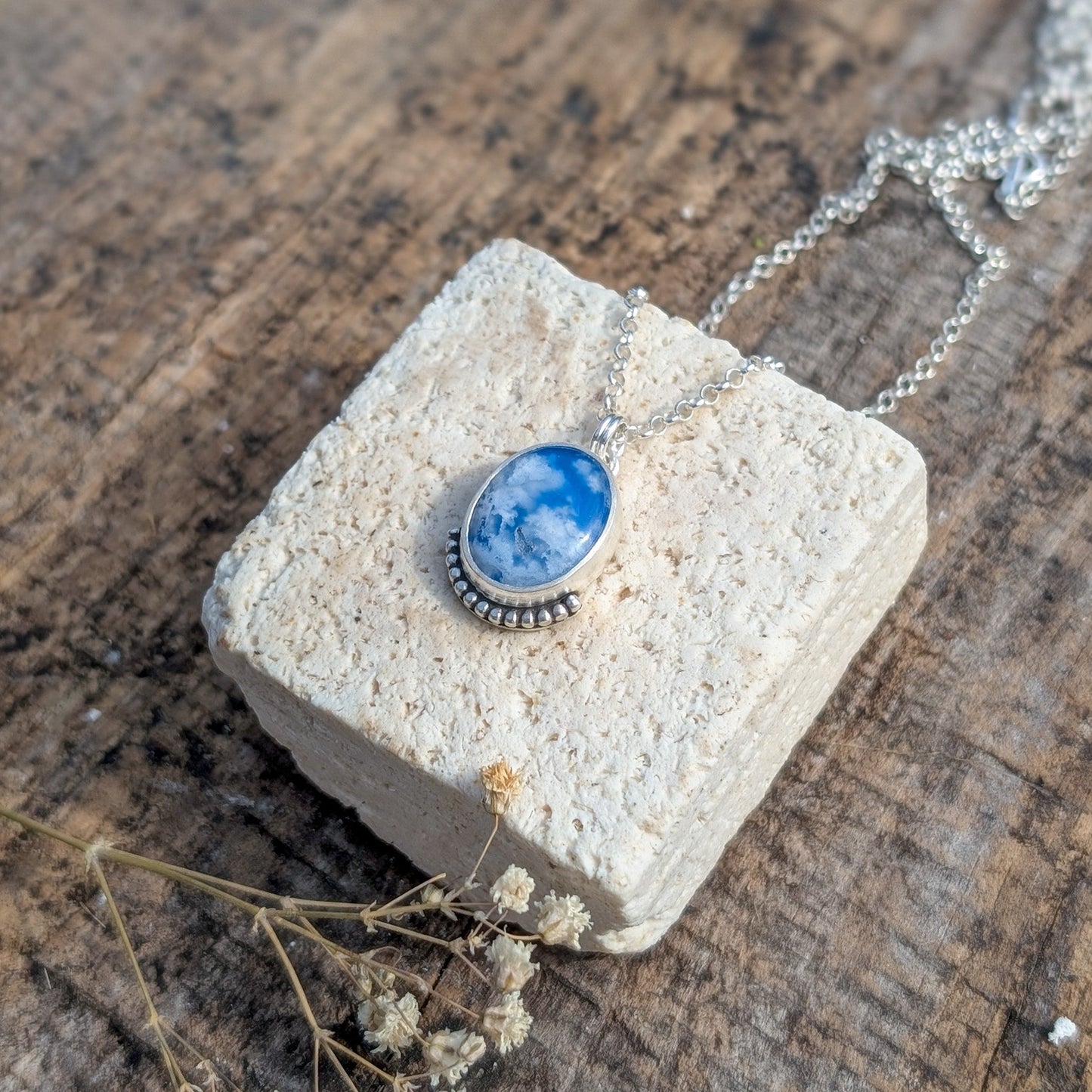 Colgante CIELO de plata con ágata pluma