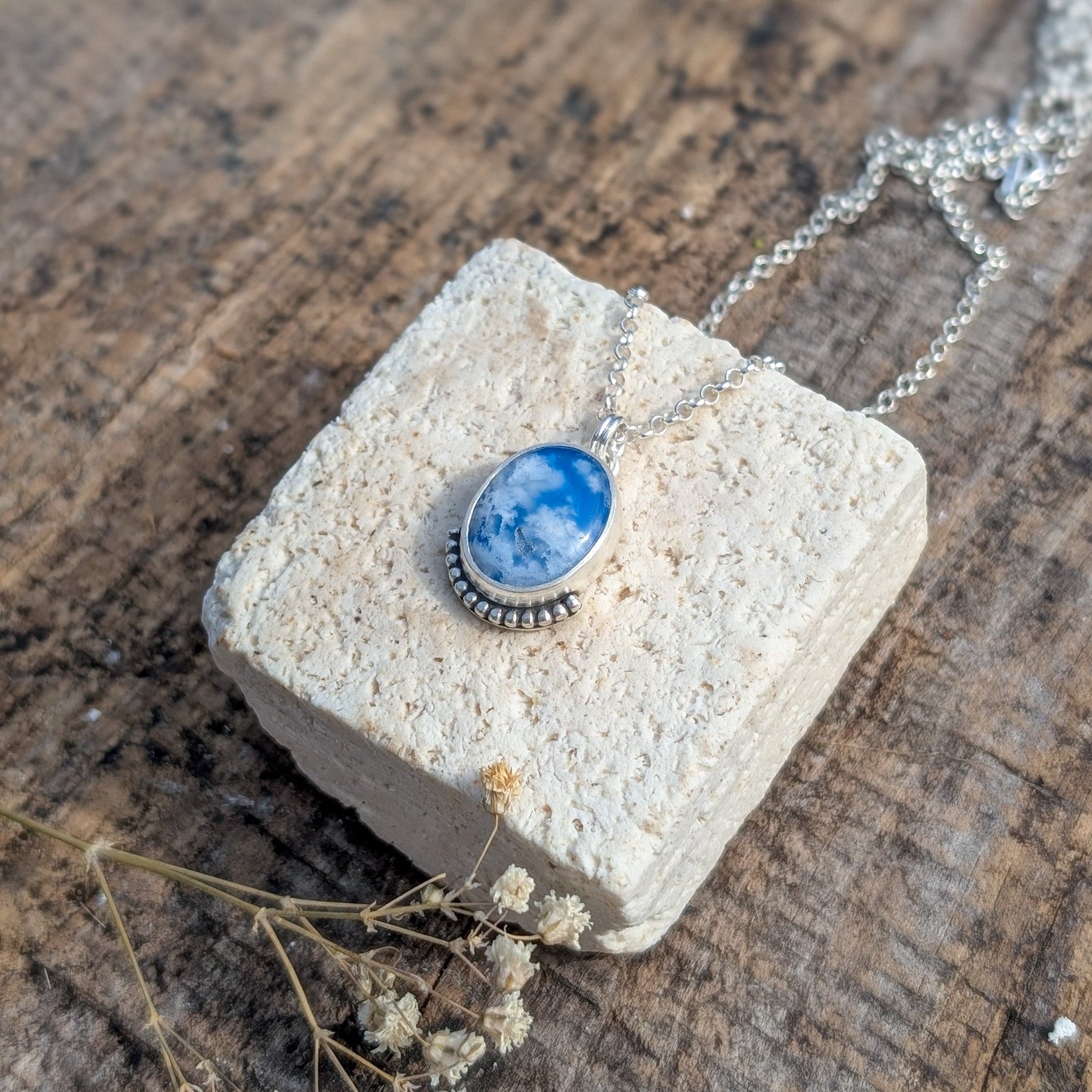 Colgante CIELO de plata con ágata pluma