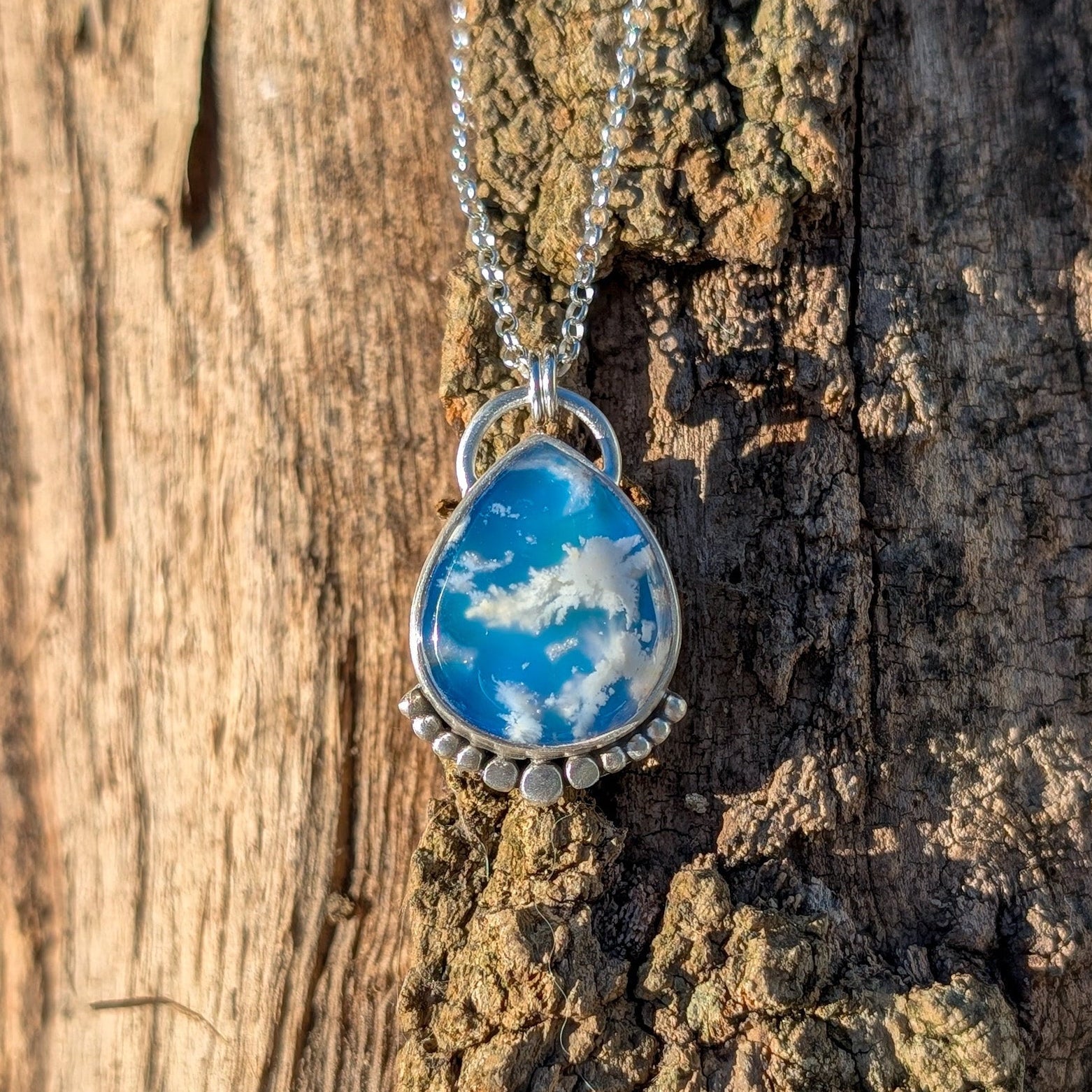 Colgante de plata con ágata pluma