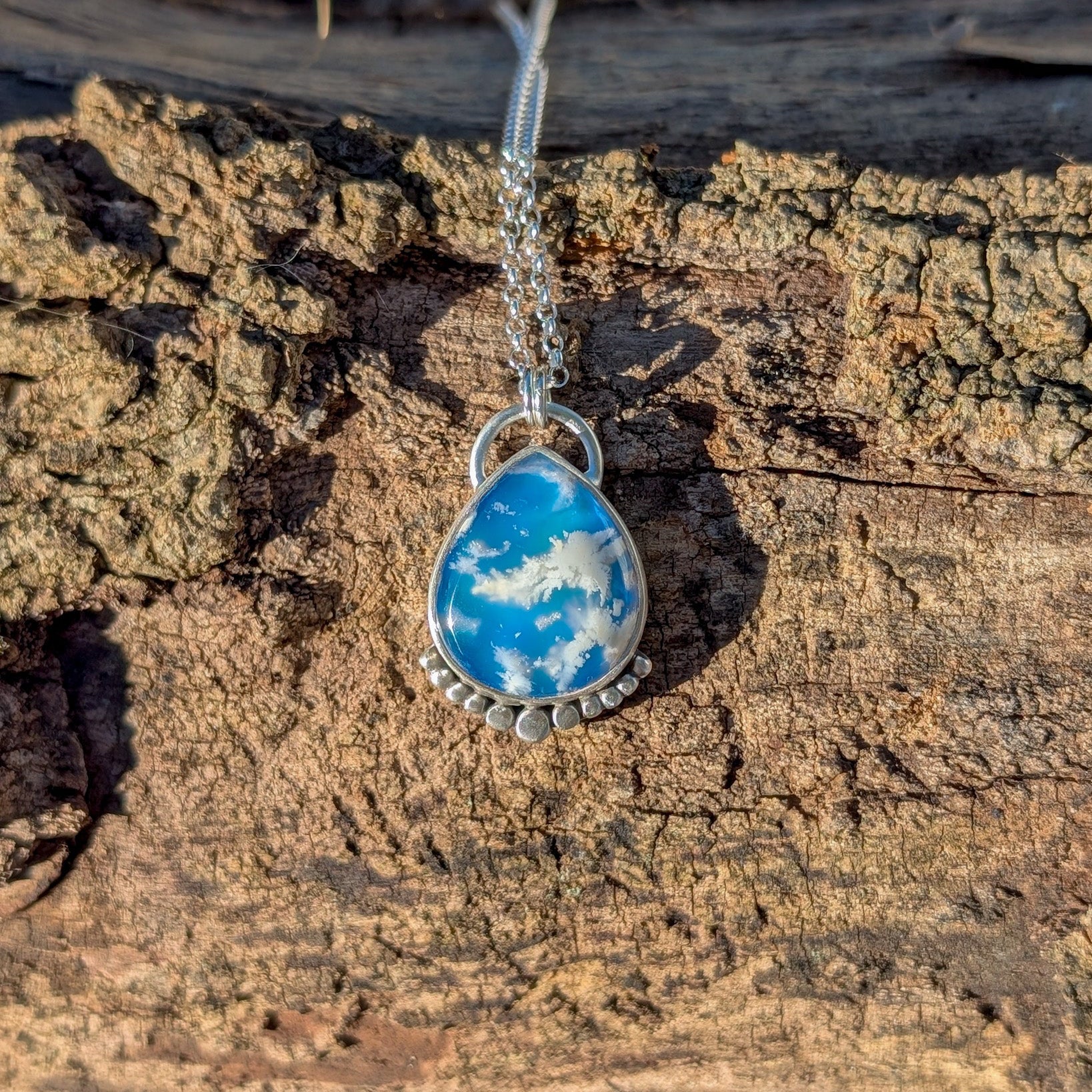 Colgante de plata con ágata pluma