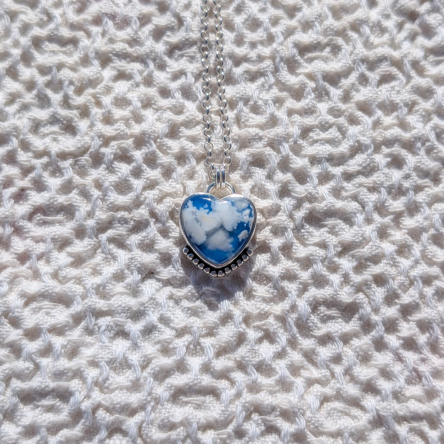 Colgante CIELO Corazón en plata con Ágata pluma