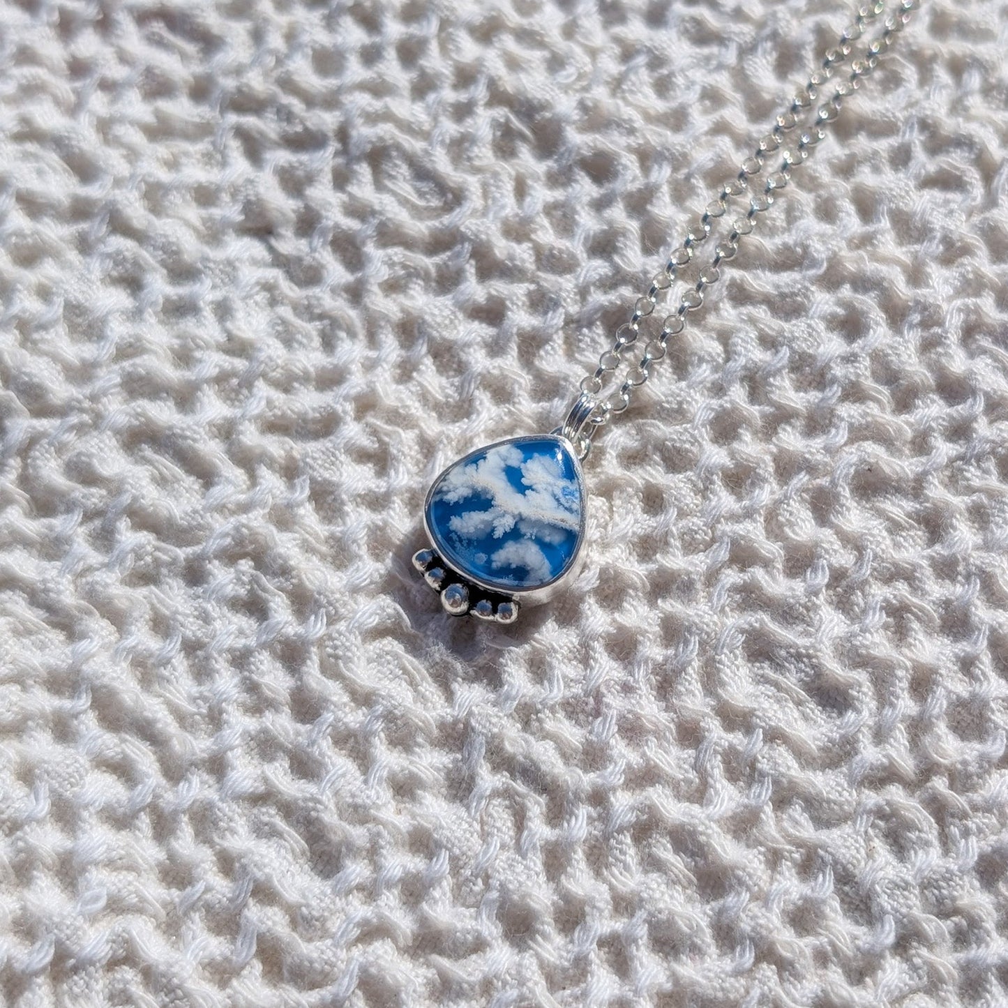 Colgante Cielo de plata con Agata Pluma