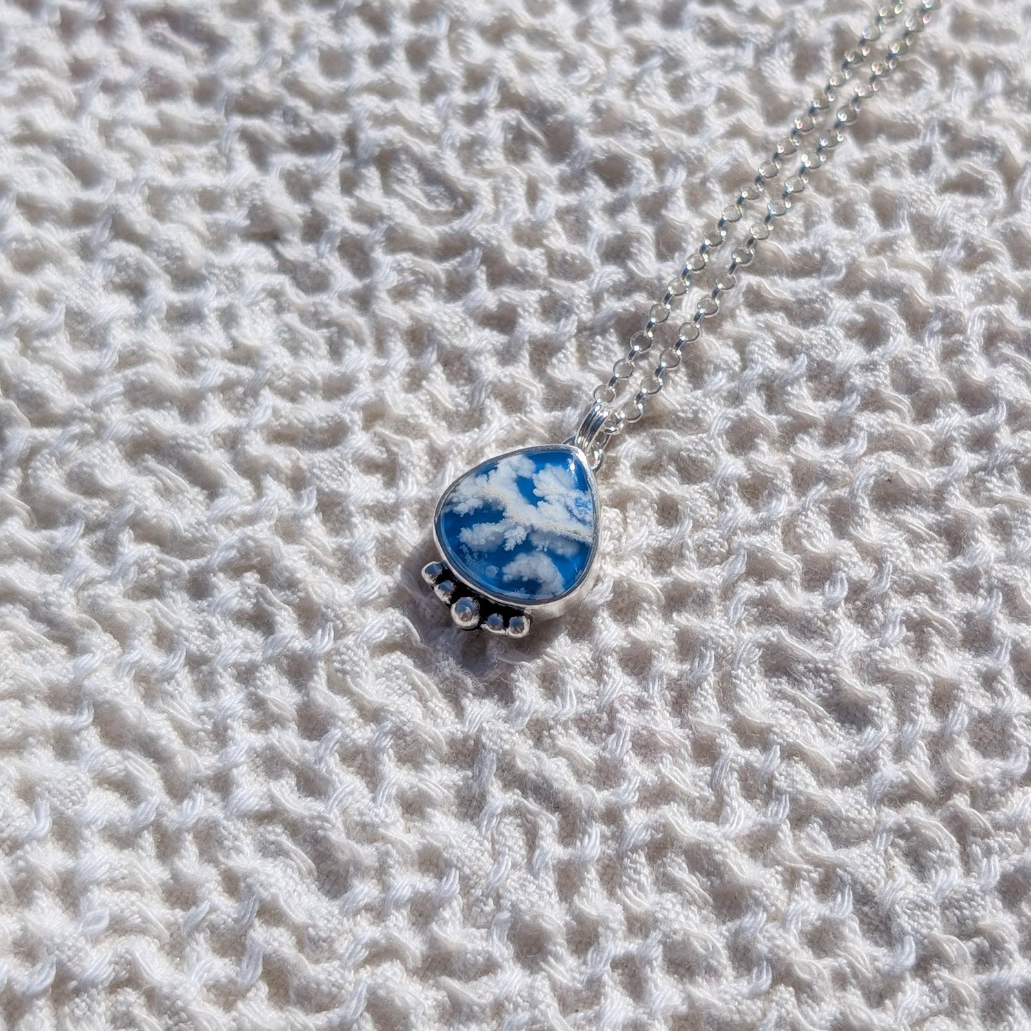 Colgante Cielo de plata con Agata Pluma