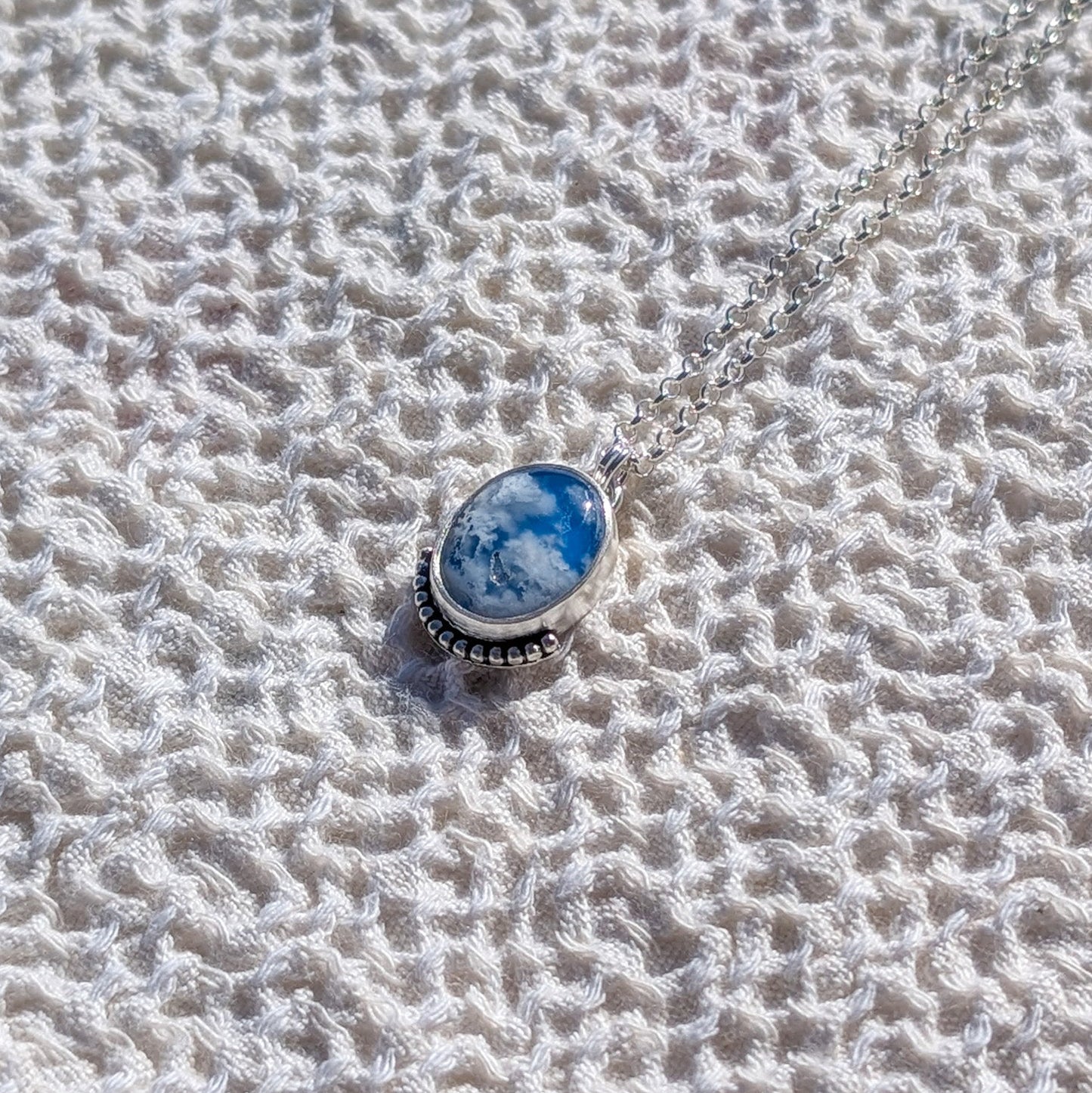 Colgante de plata CIELO con Ágata pluma