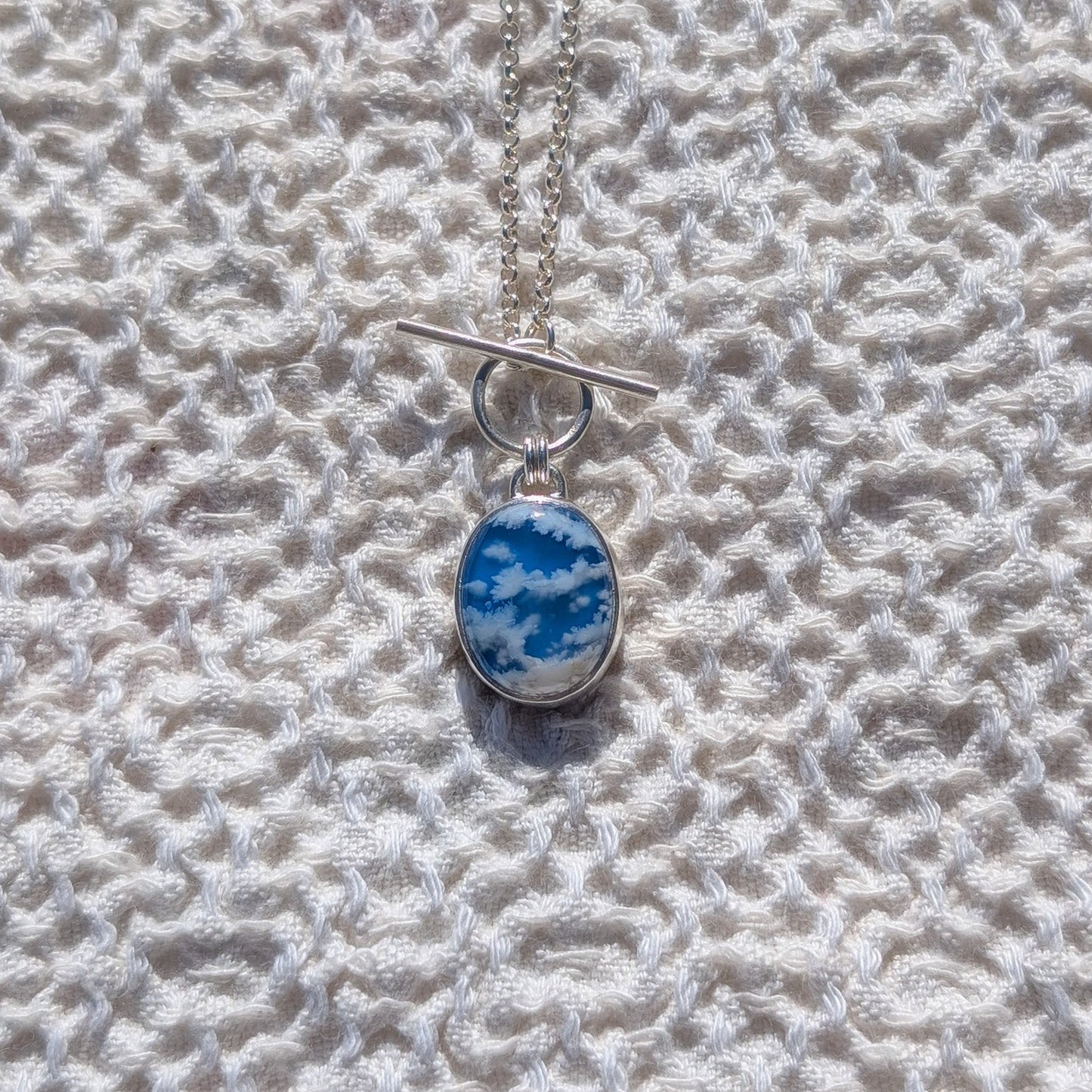 Colgante CIELO en plata con Ágata pluma