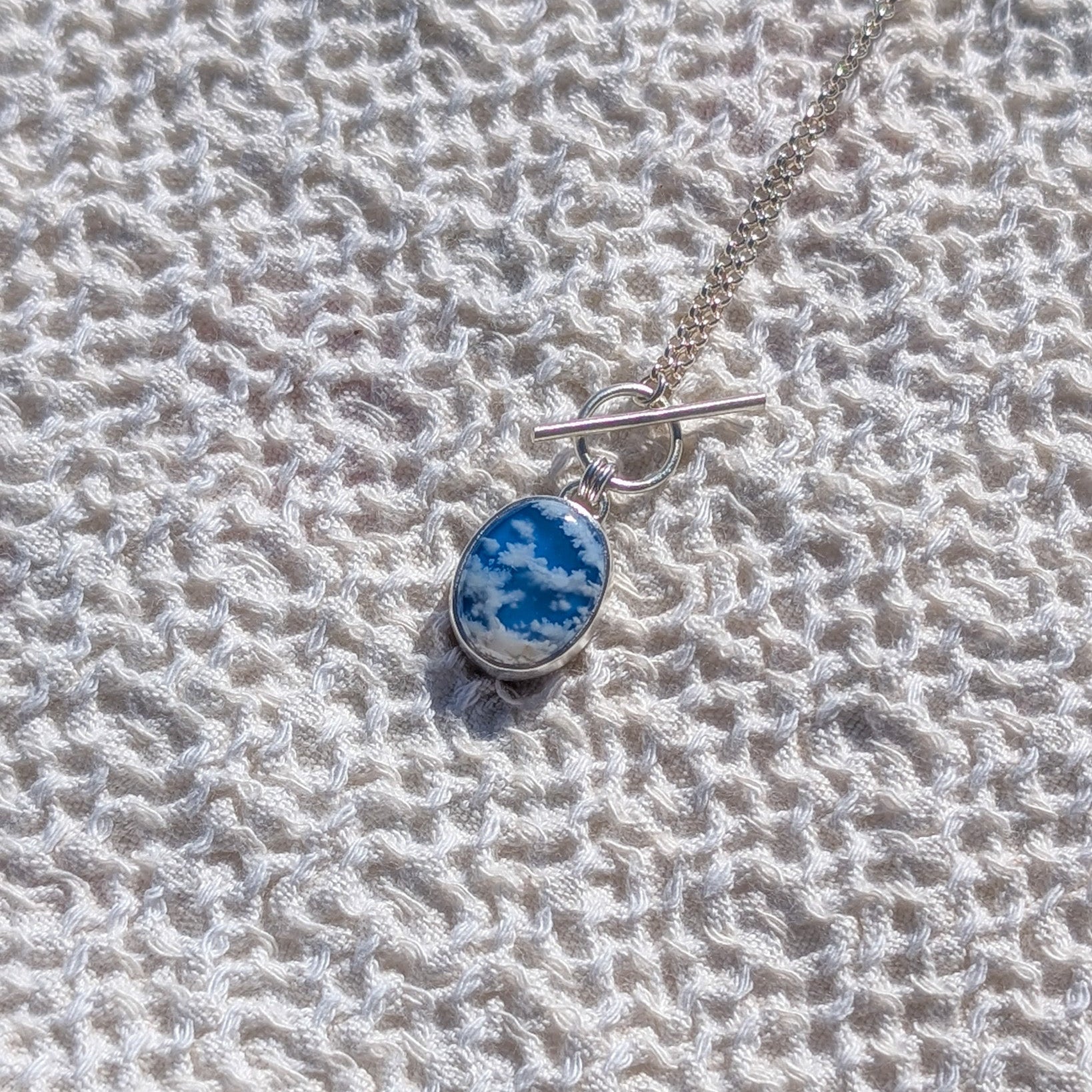 Colgante CIELO en plata con Ágata pluma