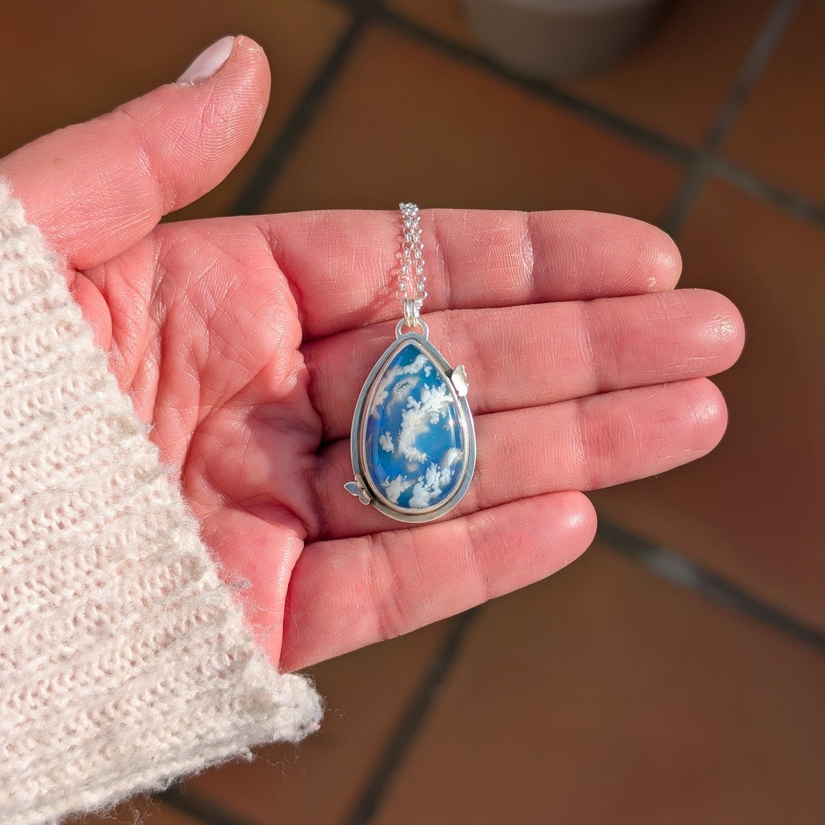 Colgante de plata con doblete de ágata pluma