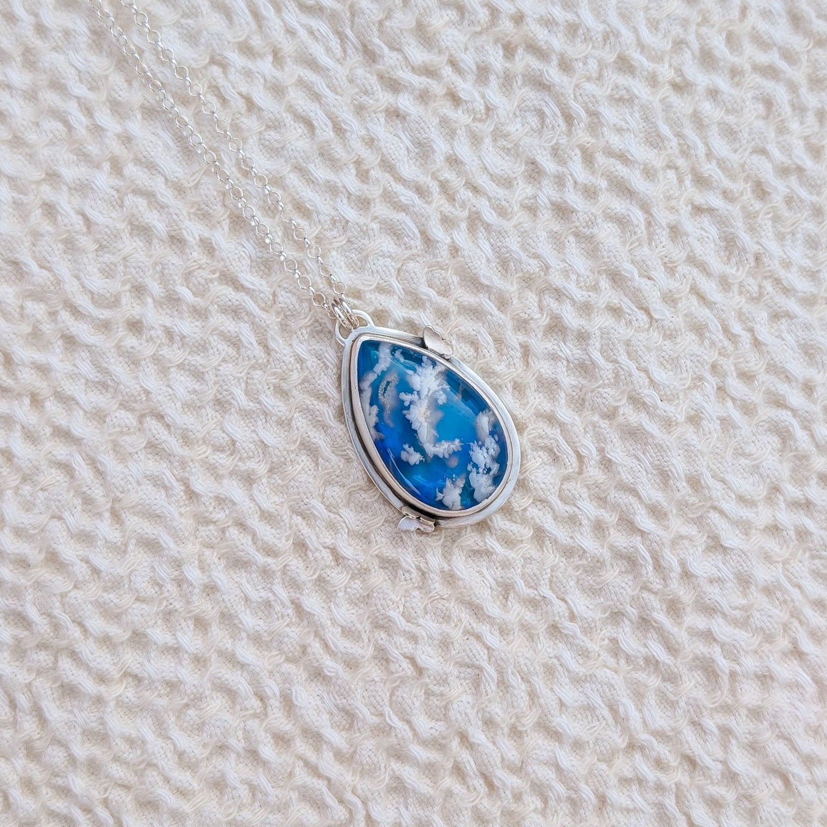 Colgante de plata con ágata pluma