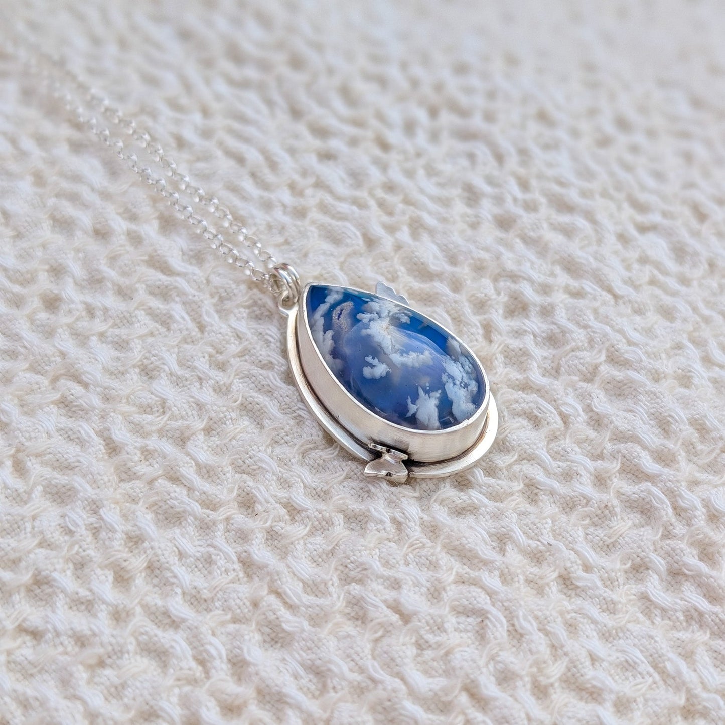 Colgante de plata con doblete de ágata pluma