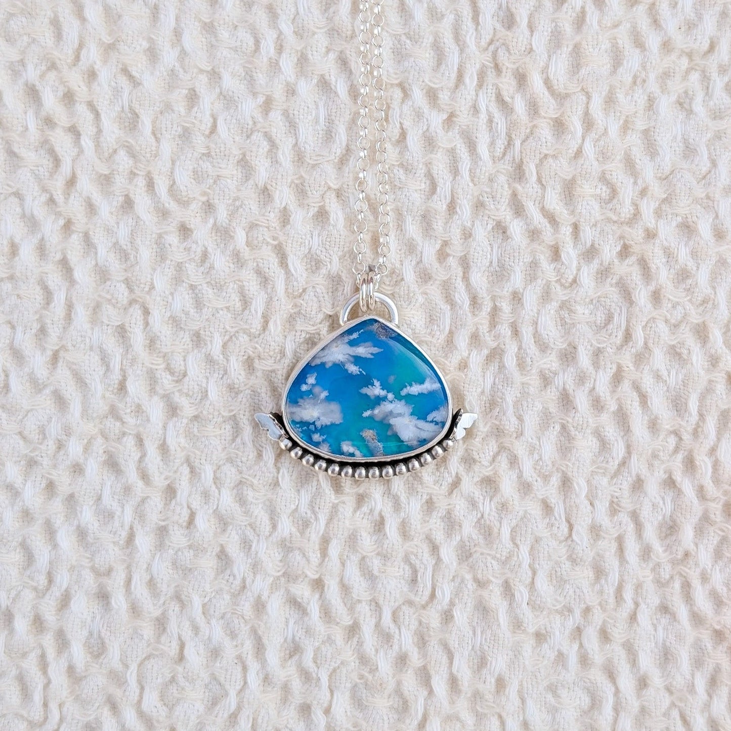 Colgante de plata con doblete de ágata pluma