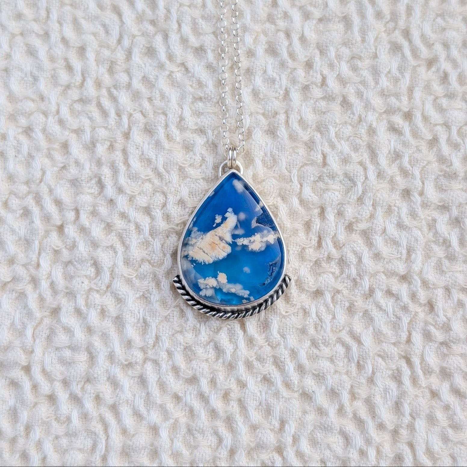 Colgante de plata con doblete de ágata pluma